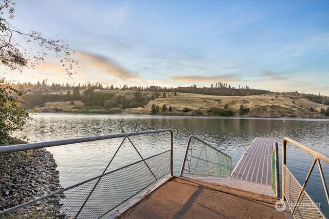 view of dock featuring a water view