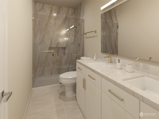 bathroom featuring tile patterned floors, toilet, vanity, and tiled shower