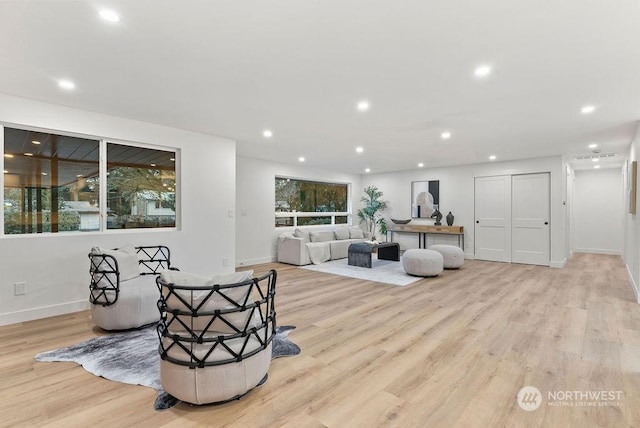 living room with light hardwood / wood-style floors