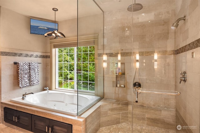 full bath featuring a stall shower and a tub with jets