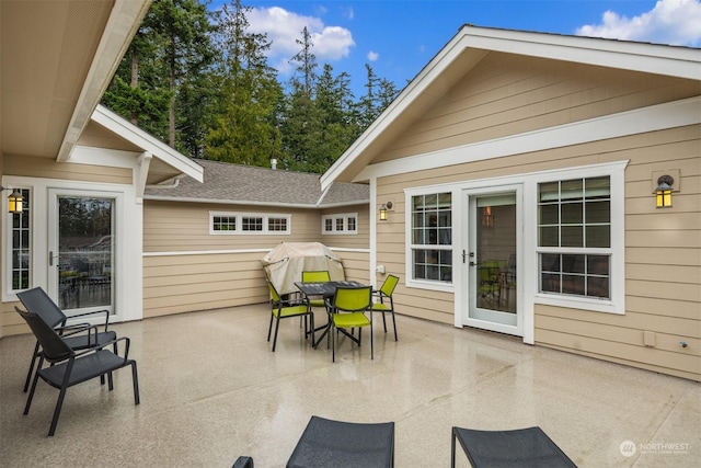 view of patio featuring outdoor dining area