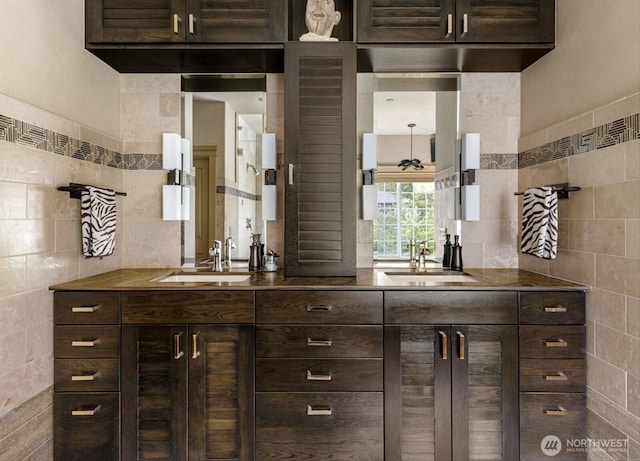 bar with tile walls and a sink