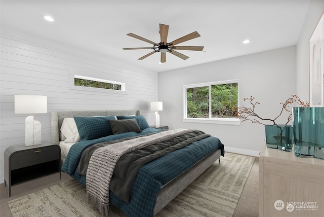 carpeted bedroom with ceiling fan