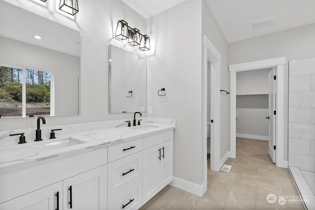 bathroom featuring vanity and tile patterned floors