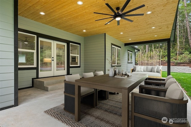 view of patio / terrace with outdoor lounge area, ceiling fan, and french doors