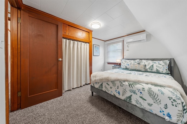 carpeted bedroom with lofted ceiling and an AC wall unit