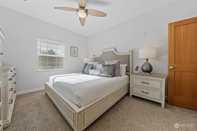 bedroom with light carpet and ceiling fan