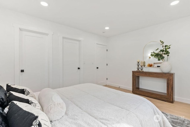 bedroom featuring light wood-type flooring