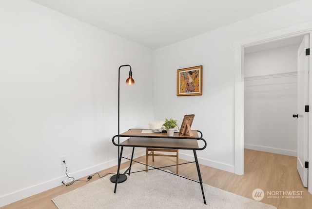 home office featuring light hardwood / wood-style floors