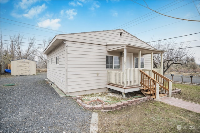 view of front of property with a storage unit