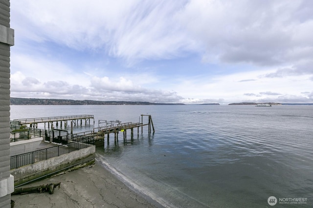 dock area featuring a water view