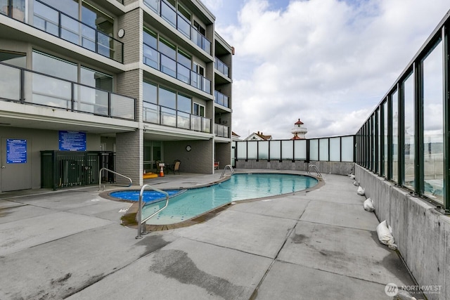 pool featuring a patio