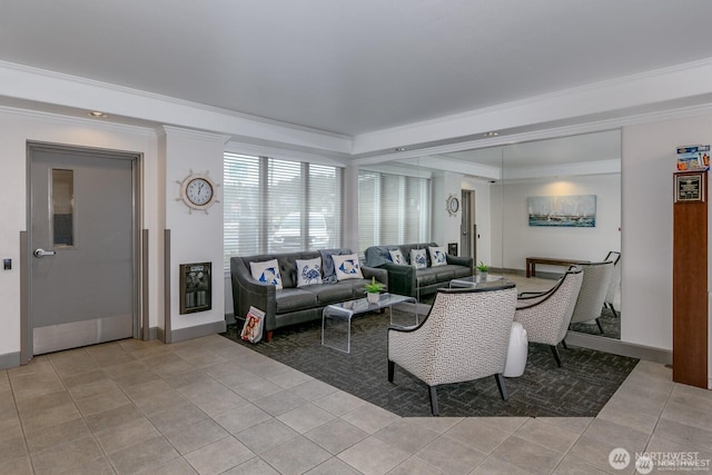 living area featuring light tile patterned flooring, baseboards, and ornamental molding