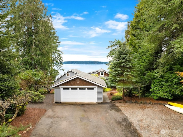 garage featuring a water view