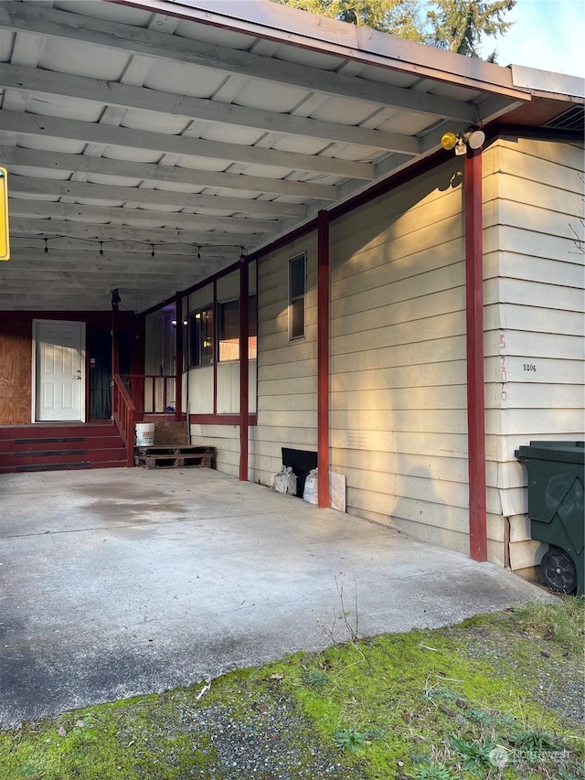 exterior space with a carport