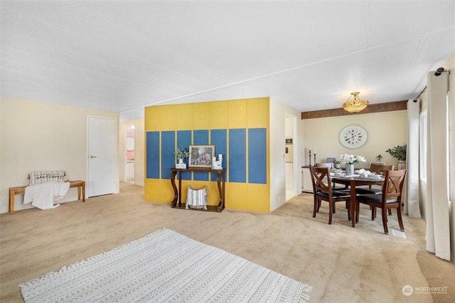 dining room featuring carpet flooring