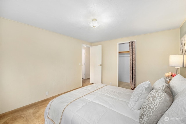 carpeted bedroom featuring a closet