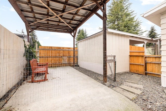 view of patio / terrace featuring an outbuilding