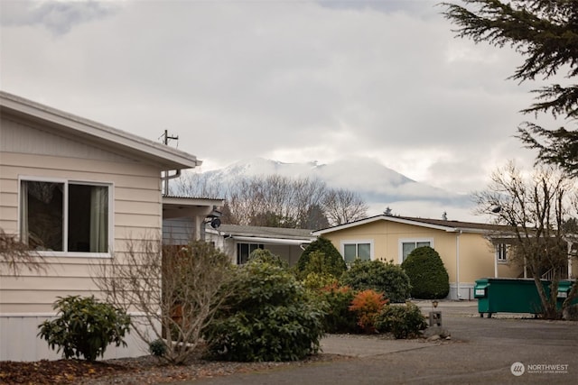 view of home's exterior featuring a mountain view