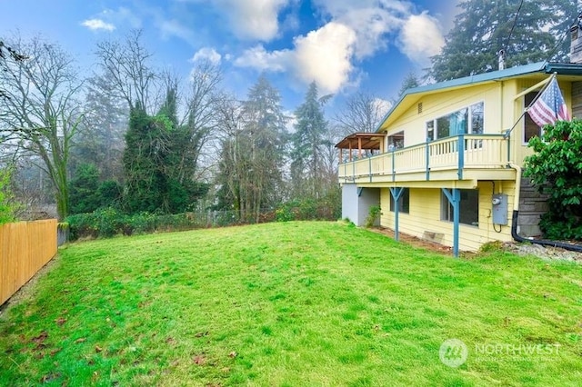 view of yard featuring a wooden deck