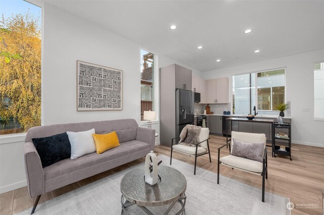 730C Broadway E, Seattle, WA 98102 - living room with light wood-style floors and recessed lighting