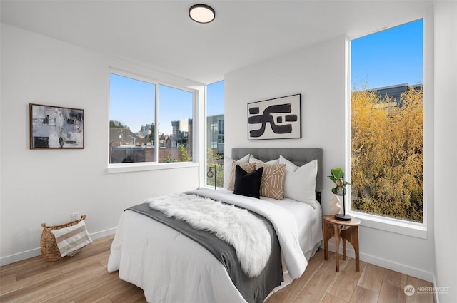 bedroom featuring light wood-type flooring