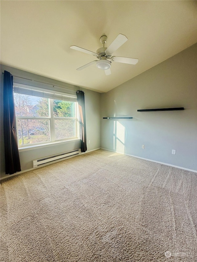 carpeted empty room with a baseboard radiator, vaulted ceiling, and ceiling fan