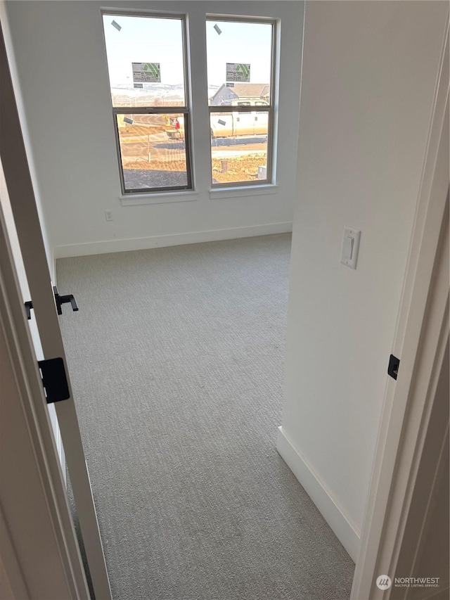 empty room featuring carpet floors