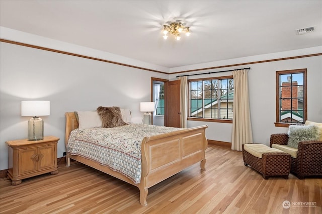 bedroom featuring light hardwood / wood-style flooring