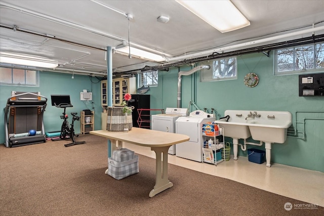 basement with washer and clothes dryer