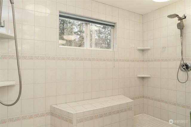 bathroom featuring tiled shower