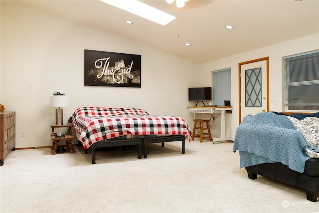 bedroom featuring ceiling fan, lofted ceiling, and light carpet