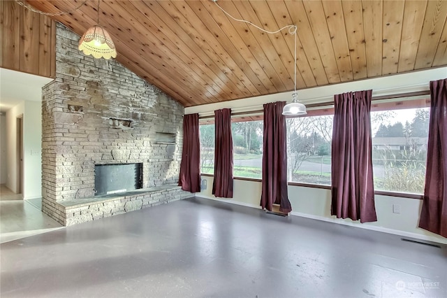 unfurnished living room with a stone fireplace, wooden ceiling, high vaulted ceiling, and concrete flooring