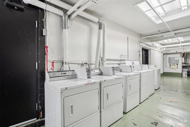 laundry room featuring washer and clothes dryer