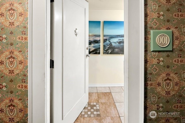 bathroom with tile patterned floors