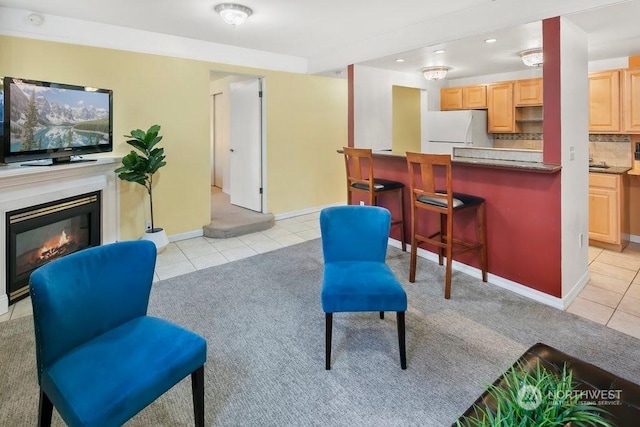 living room with light tile patterned floors