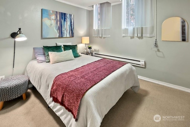 carpeted bedroom featuring baseboard heating and ornamental molding