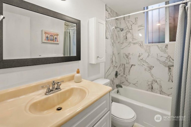 full bathroom with shower / bath combination with curtain, vanity, and toilet