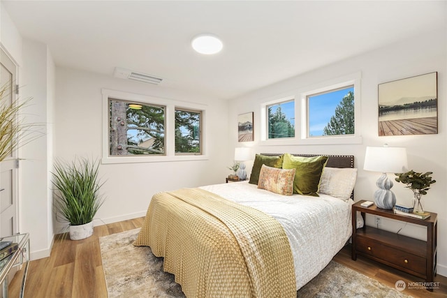 bedroom featuring hardwood / wood-style flooring