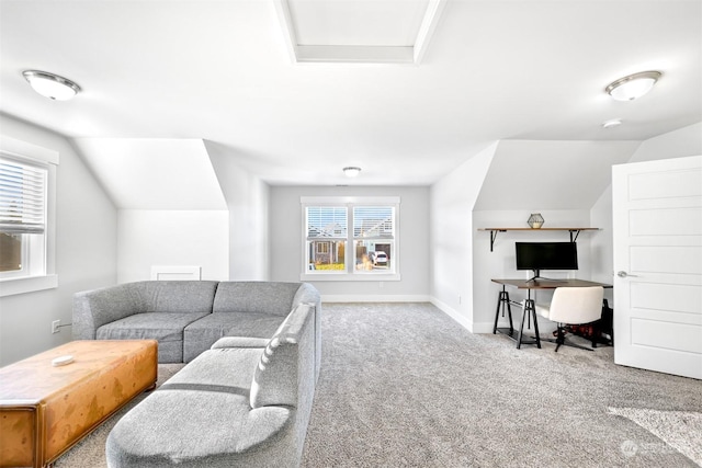 living room featuring carpet, a wealth of natural light, and vaulted ceiling