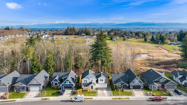 drone / aerial view featuring a mountain view