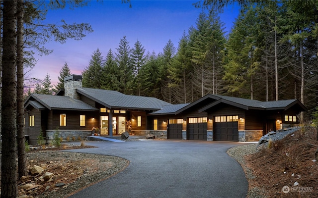 view of front of property featuring a garage