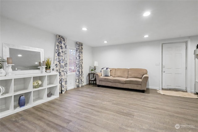 living room with light hardwood / wood-style flooring