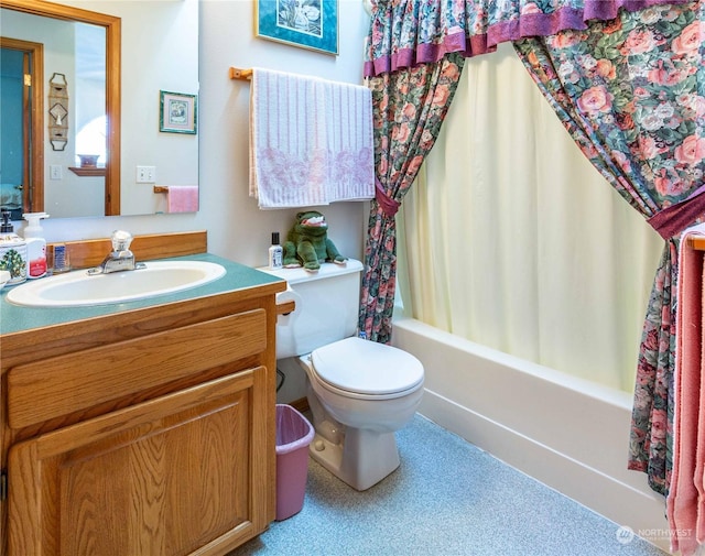 full bathroom with vanity, shower / bath combination with curtain, and toilet