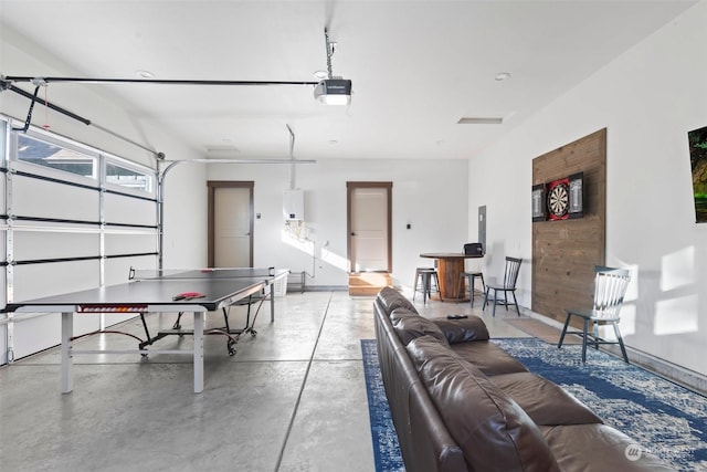 game room with concrete flooring