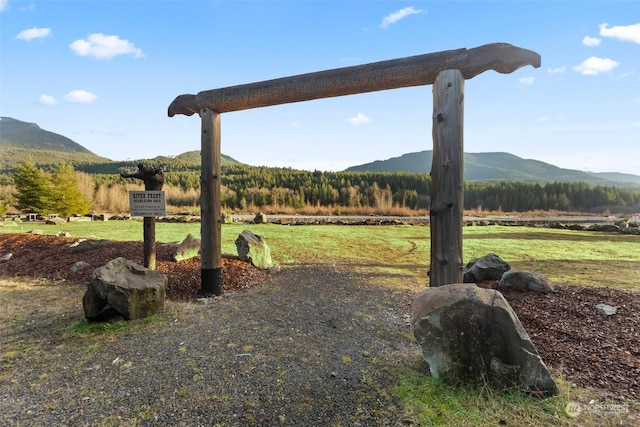 mountain view featuring a rural view