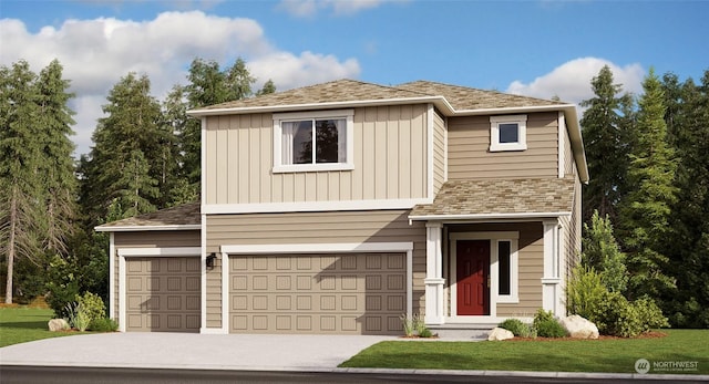 view of front of home featuring a front yard and a garage