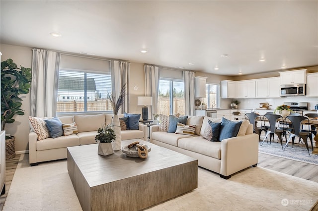 living room featuring light wood-type flooring