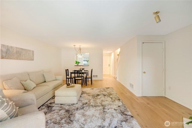 23953 58th Ct S Unit F3, Kent, WA 98032 - living area with light wood-style flooring and baseboards