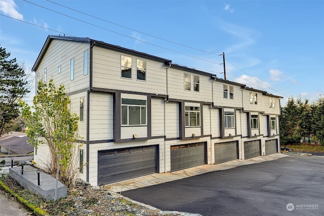 exterior space featuring an attached garage